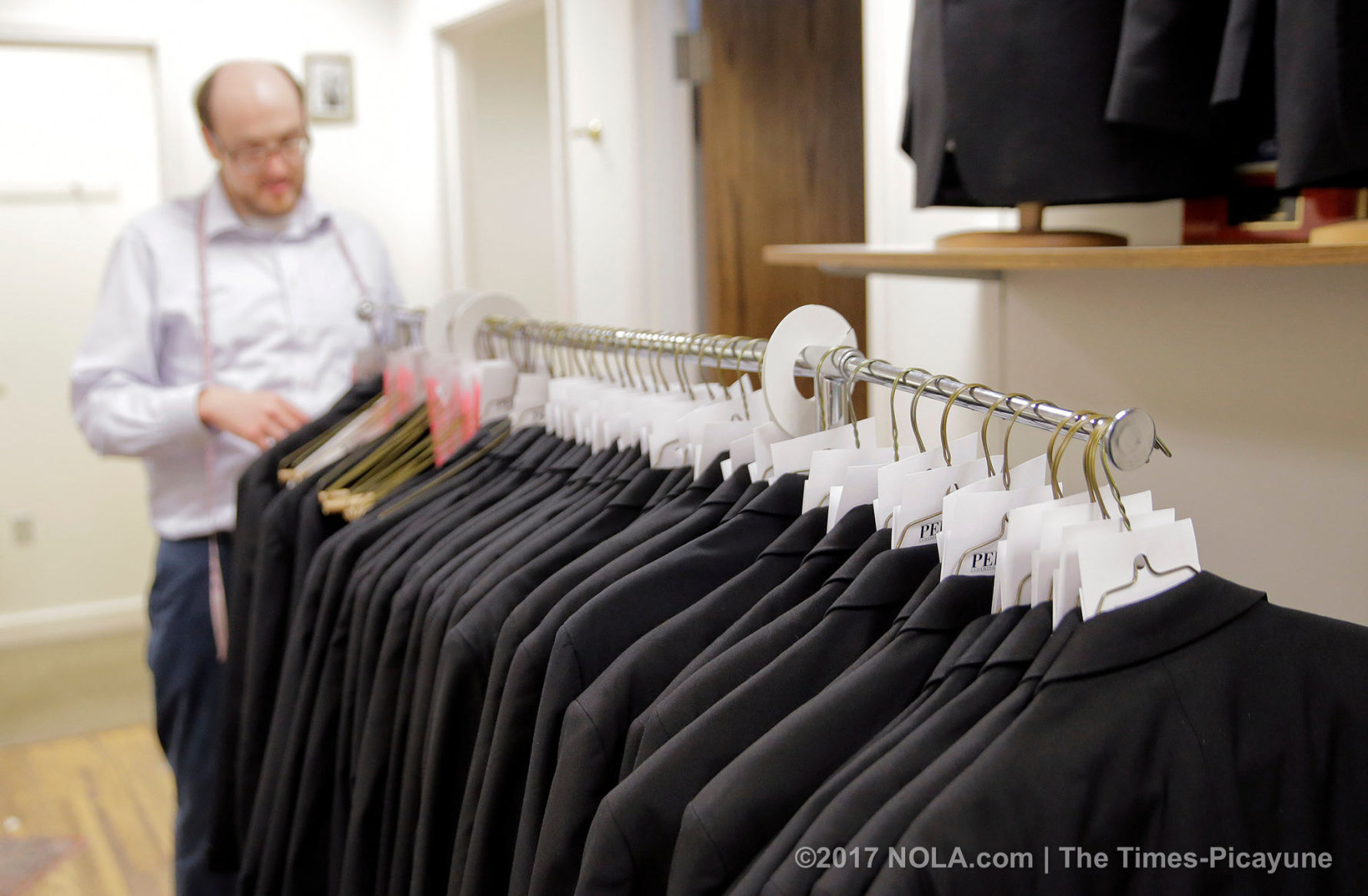 Go behind-the-scenes at Perlis, where many New Orleans men go to suit up for Carnival
